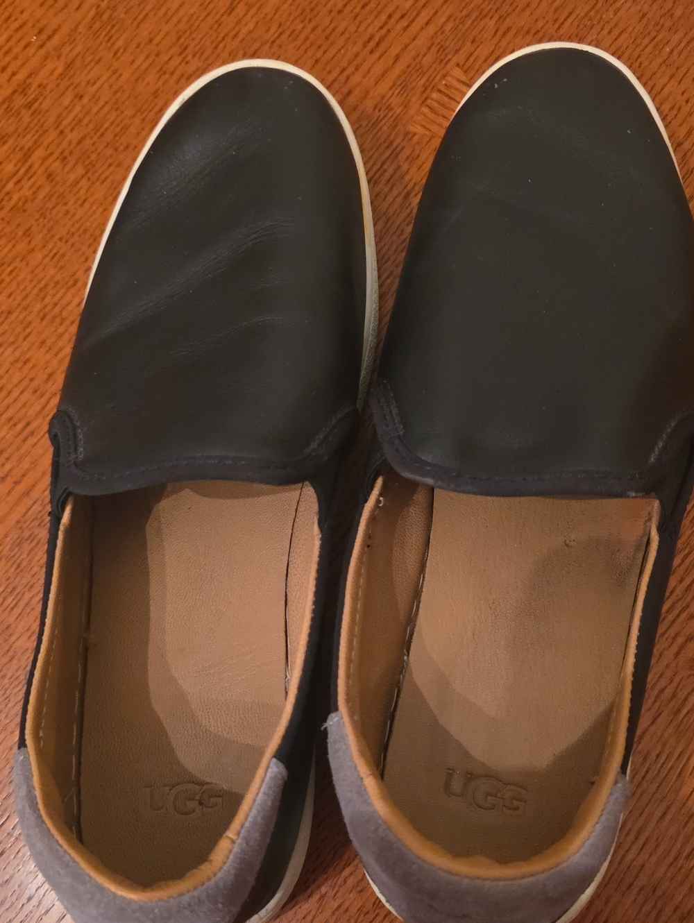 UGG Black Slip-On Sneakers with Tan Interior